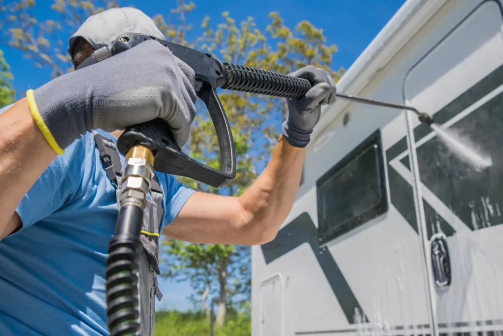 Cleaning windows with a pressure washer