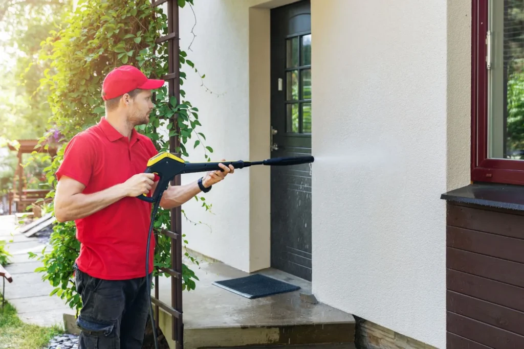 Cleaning windows with a pressure washer